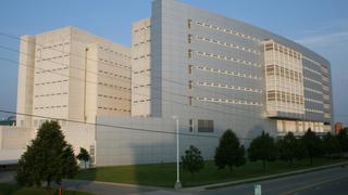 Landscape photo of an all white building. 