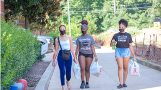 students carrying bags