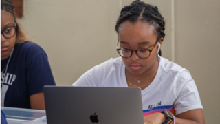 student on computer