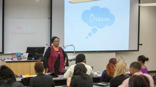 Orator giving a lecture to students