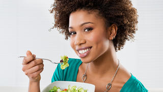 Women eating salad