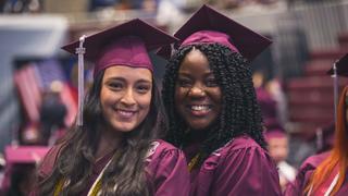 female graduates in regalia