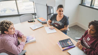 students sitting at table