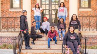 Student Accessibility Services Students in front of NCCU building.