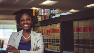 Law student Asia Skyers standing in NCCU Law Library
