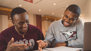 Two students reading