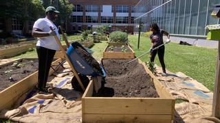 2 people gardening