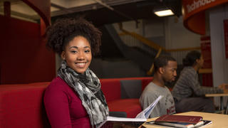 Smiling Girl in Library