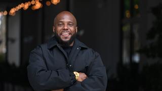 Kwame Molden in black attire