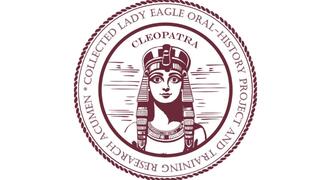 A circular maroon seal featuring an illustrated portrait of Cleopatra in the center. She wears a traditional Egyptian headdress and jewelry. Around the border, text reads: “CLEOPATRA * COLLECTED LADY EAGLE ORAL-HISTORY PROJECT AND TRAINING RESEARCH ACUMEN.