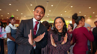 Student and Chancellor Dixon