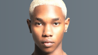 Photo of man looking forward.