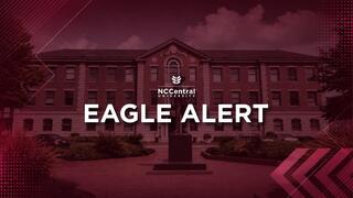 NCCU Eagle Alert graphic featuring the North Carolina Central University campus and the Eagle Alert emergency notification branding.