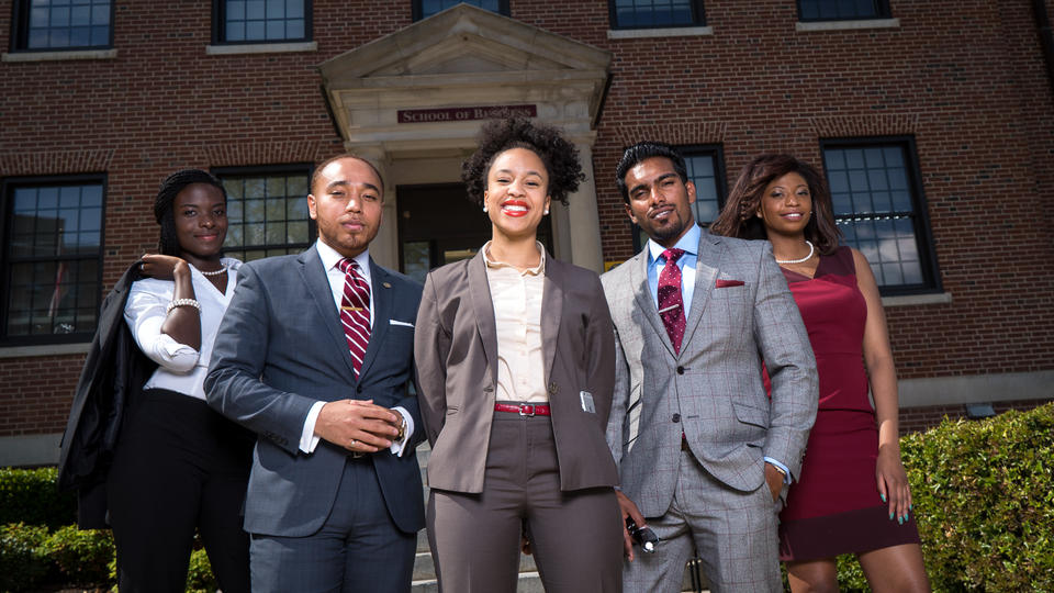 Students standing in front of School of Business