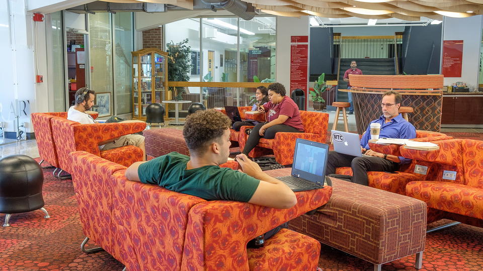 Students sitting in library