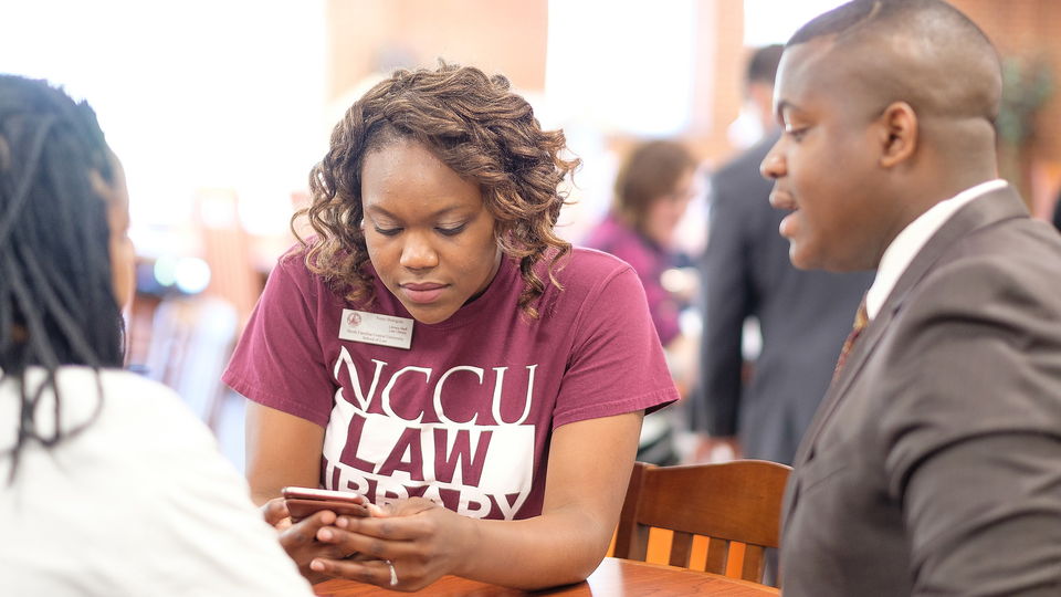 Law library student wearing law library shirt
