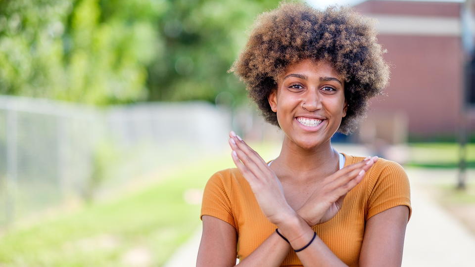 NCCU student smiling at camera.