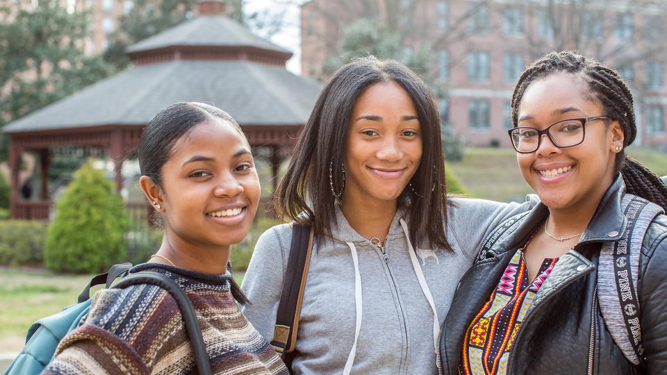 Students Smiling Outside