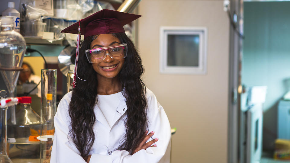 Graduate Olesia Headen in lab