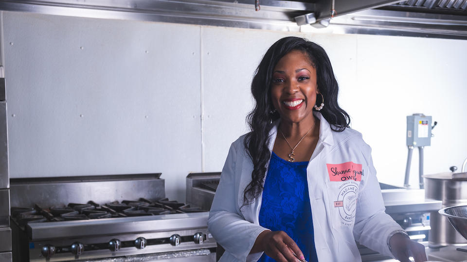 Hospitality Management graduate Shanae Bryant in Darden Culinary Laboratory
