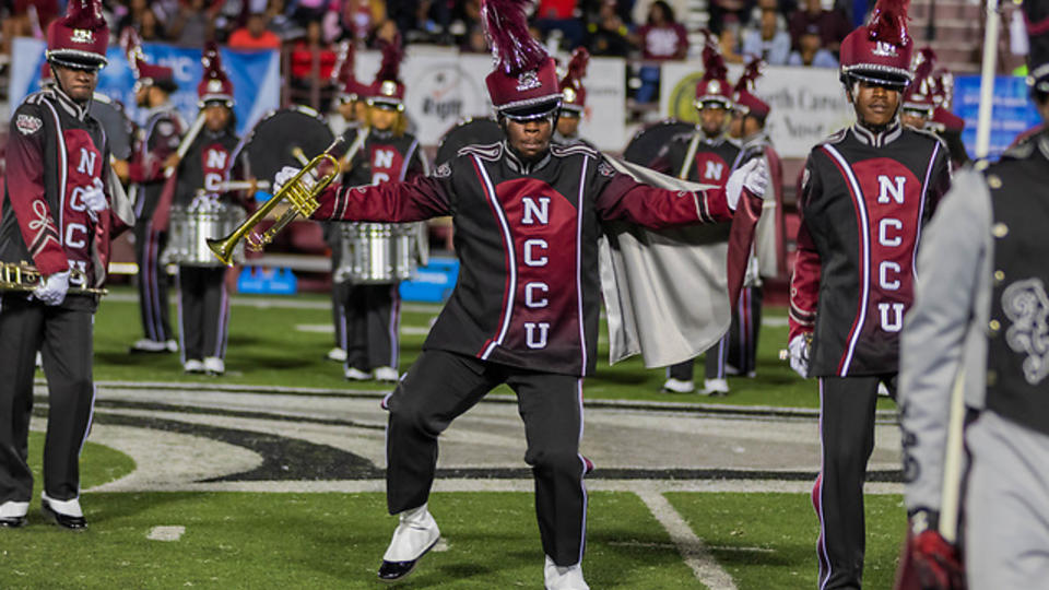 Marching band in dark uniform