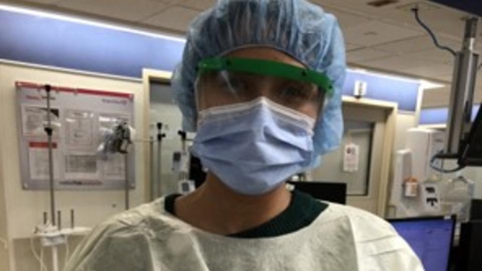 Photo of scientist/doctor in surgical attire