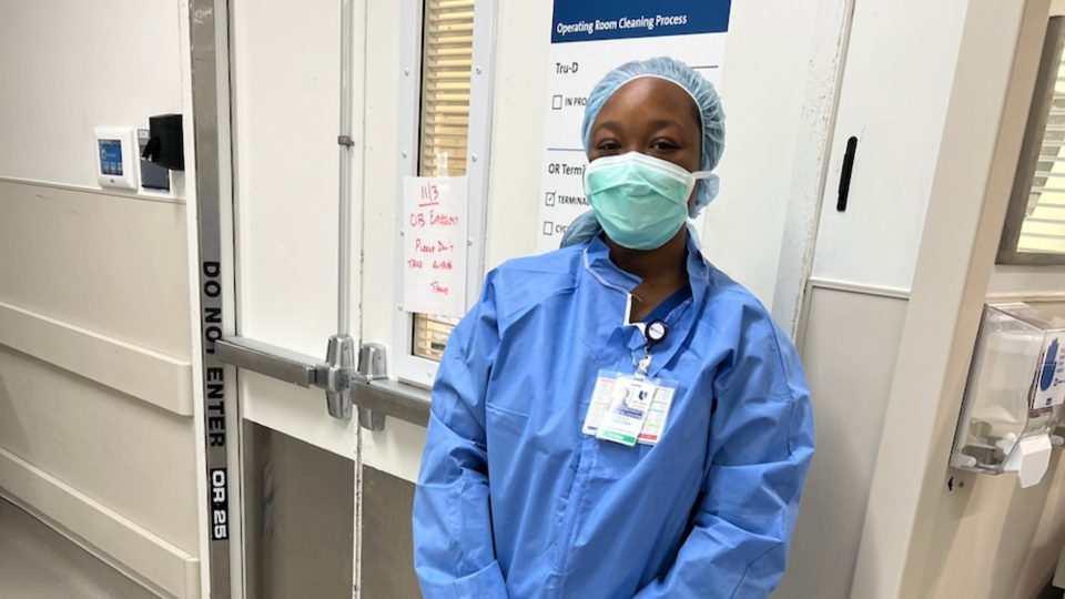 Lezly Collins in scrubs