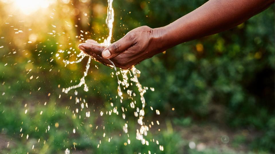 running water in to a hand