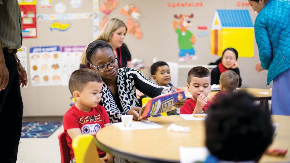 Grad student assists child