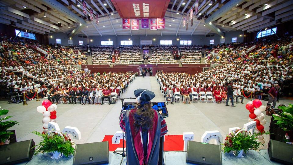 North Carolina Central University leader Chancellor Dixon addresses a large audience of students and guests during a campus event inside McDougald-McLendon Arena.
