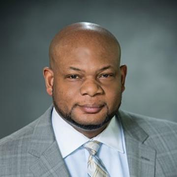 Headshot of Lester McCollum