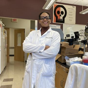 Assistant Professor Carresse Gerald in a laboratory.