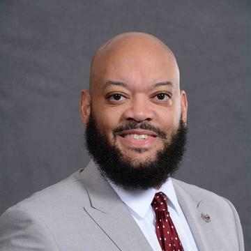 Michael E. Hill
