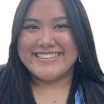 Professional headshot of Gaomomee Yang smiling with long dark hair.