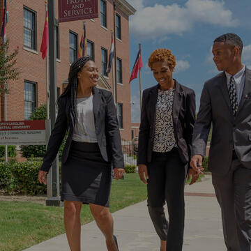 School of Business students walking outside.