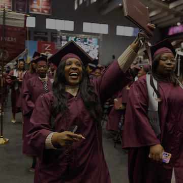 Procession of graduates at NCCU commencement.
