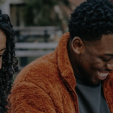 Two People Smiling
