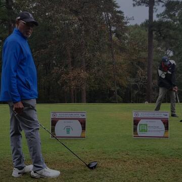 Alumni playing Golf