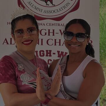 Two Alumni on Eagle Pose