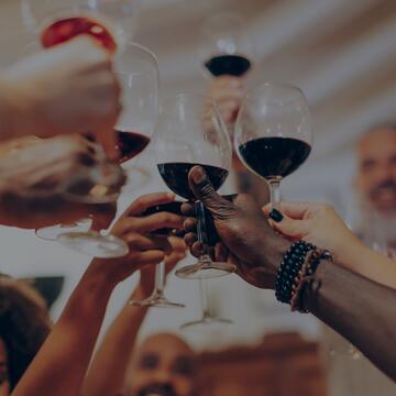 toasting with wine glasses