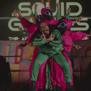 Dancers on a stage for NCCU step show