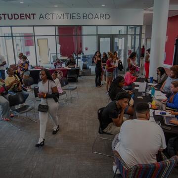 Student inside the Activity Board Center